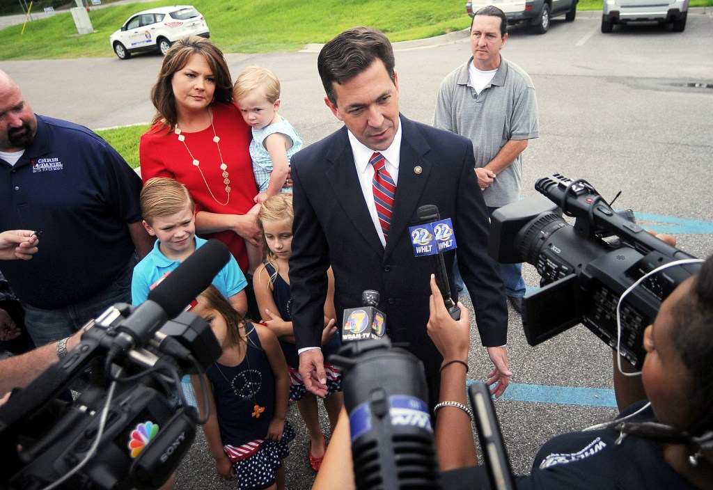 State Sen. Chris McDaniel speaks with the media before voting at the George Harrison Building, Tuesday, June 24, 2014, in Ellisville, Miss.
