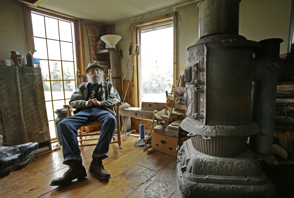 Burt Shavitz rests inside his camp on his property in Parkman. The Associated Press/Robert F. Bukaty 