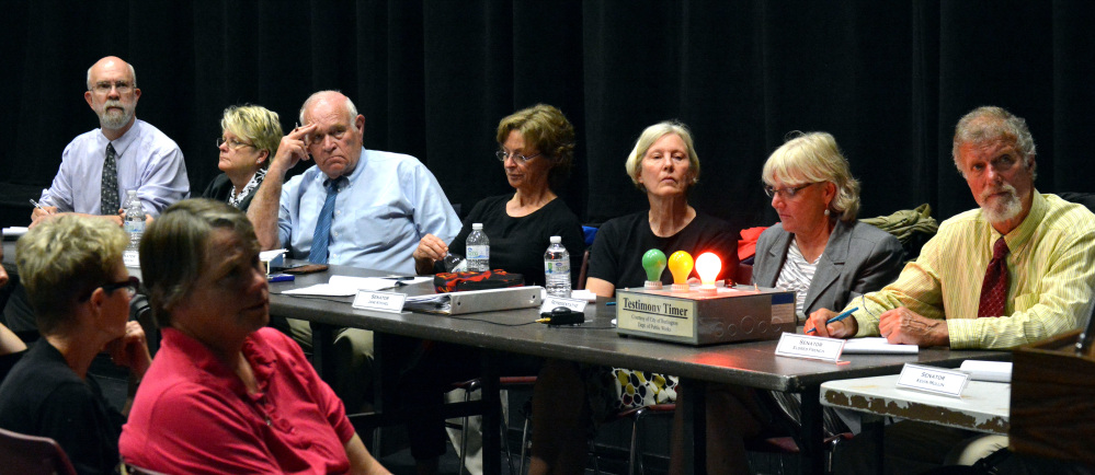 The Associated Press A panel of Vermont legislators takes public testimony during a hearing on child protection Tuesday evening, June 3, 2014 in Rutland, Vt. The panel is starting a tour to get a public perspective on how well the state agency charged with protecting children is doing.   (AP Photo/The Rutland Herald, Albert J. Marro)