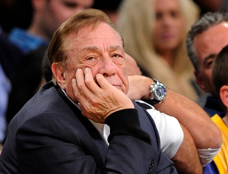  In this Feb. 25, 2011, file photo, Los Angeles Clippers owner Donald Sterling looks on during the first half of their NBA basketball game against the Los Angeles Lakers in Los Angeles. The Associated Press