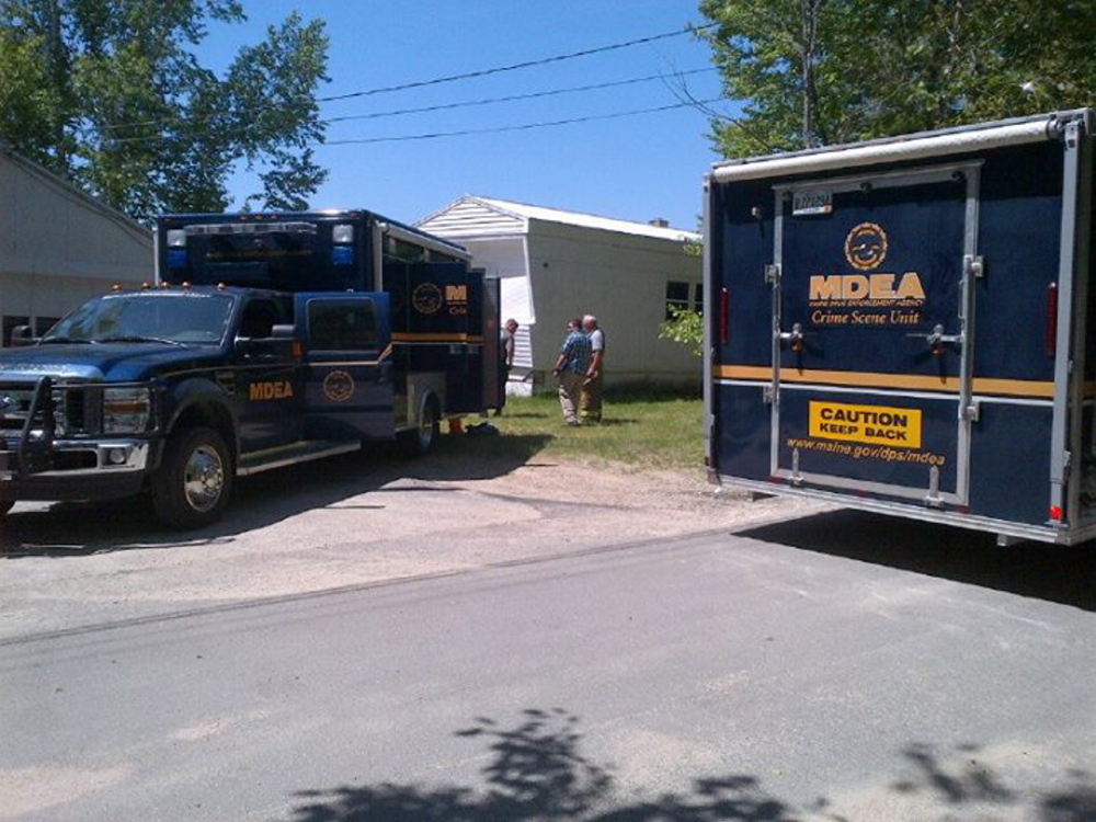 A police team gathers at a suspected methamphetamine lab on Stone Road in Newfield on Tuesday, June 3, 2014.
Courtesy Maine Drug Enforcement Agency