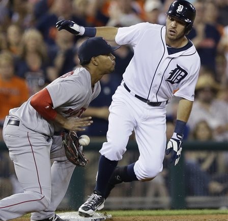 Tigers second baseman Ian Kinsler beats the throw to Red Sox third baseman Xander Bogaerts for an RBI triple in the sixth inning Saturday in Detroit. The Associated Press