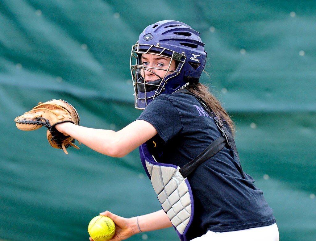 Margaret Rigney, a junior catcher who’s playing softball for the first time since sixth grade, has been a key newcomer to Cheverus’ lineup. John Patriquin/Staff Photographer