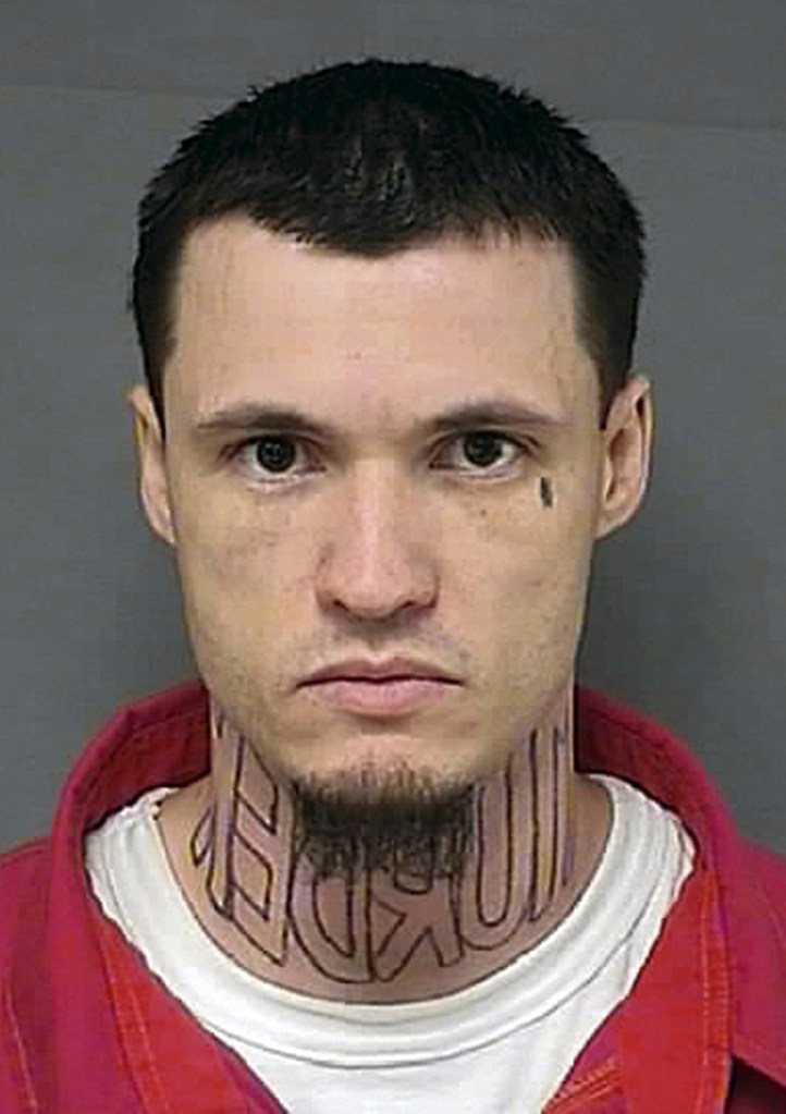 The Associated Press This undated booking photo from the Kansas Department of Corrections shows Jeffrey Chapman, charged with first-degree murder in the November 2011 killing of Damon Galliart. After his attorney claimed it would be prejudicial, Chapman will be allowed to wear a turtleneck to cover a tattoo on his neck of the word “murder” spelled backward when his trial begins in August 2014.