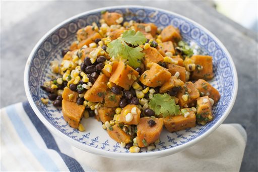 Sweet potato, grilled corn and black bean salad with spicy cilantro dressing. This recipe swaps sweet potatoes for the more traditional white potatoes and loses the standard recipes abundant mayonnaise in favor of a dressing high in flavor and low in fat. The Associated Press