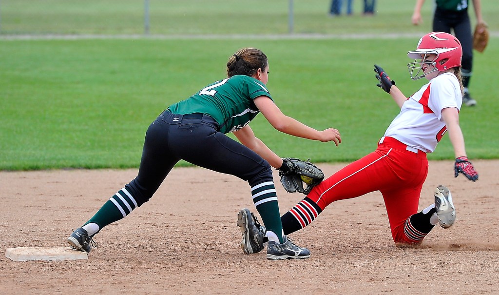 Bonny Eagle shortstop Breanna Lifland tags out South Portland’s Michaela Willwerth, who tried to stretch a single into a double during Thursday’s playoff game won by Bonny Eagle. Gordon Chibroski/Staff Photographer