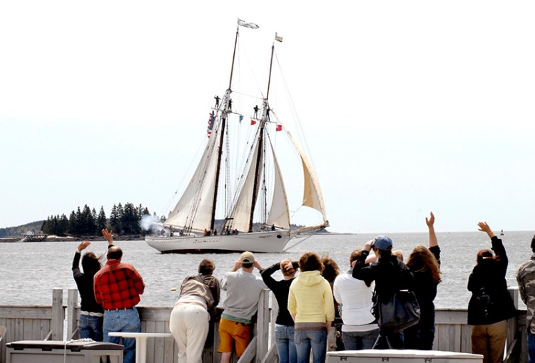 In this 2008 file photo, family and friends wave to the The Spirit of Massachusetts as it returns today to Boothbay Harbor with 17 students that are with the Ocean Classrooms program. John Patriquin/ Staff Photographer
