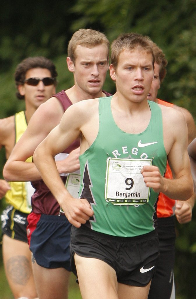 Patrick Tarpy of Yarmouth, runs close behind Ben True in the TD Bank Beach to Beacon 10K road race in Cape Elizabeth in this 2010 photo.

Gregory Rec/Staff Photographer: