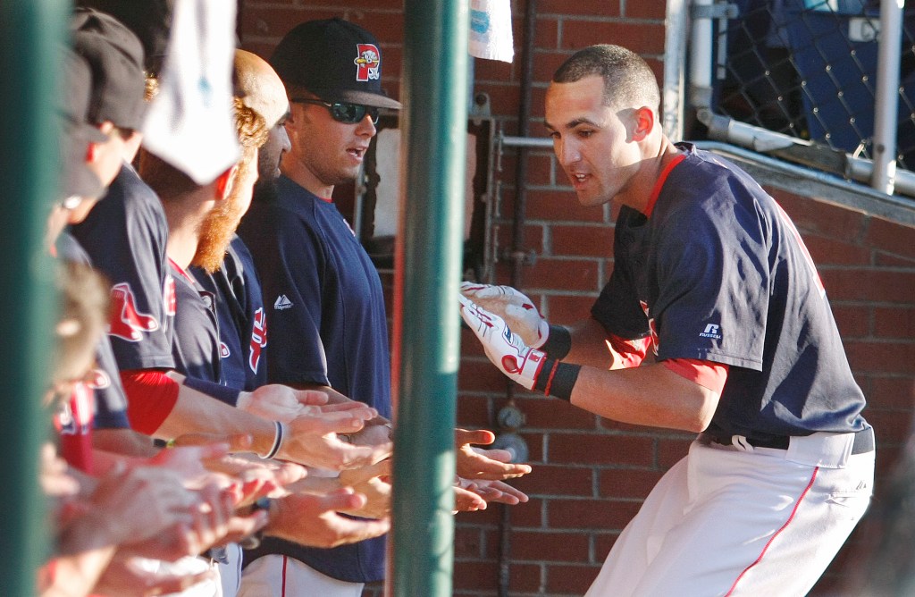 Sea Dog shortstop Derrik Gibson greets his teammates after cracking a home run on the first pitch in the first inning against the New Hampshire Fisher Cats on July 11 at Hadlock Field in Portland. Press Herald File Photo/Jill Brady