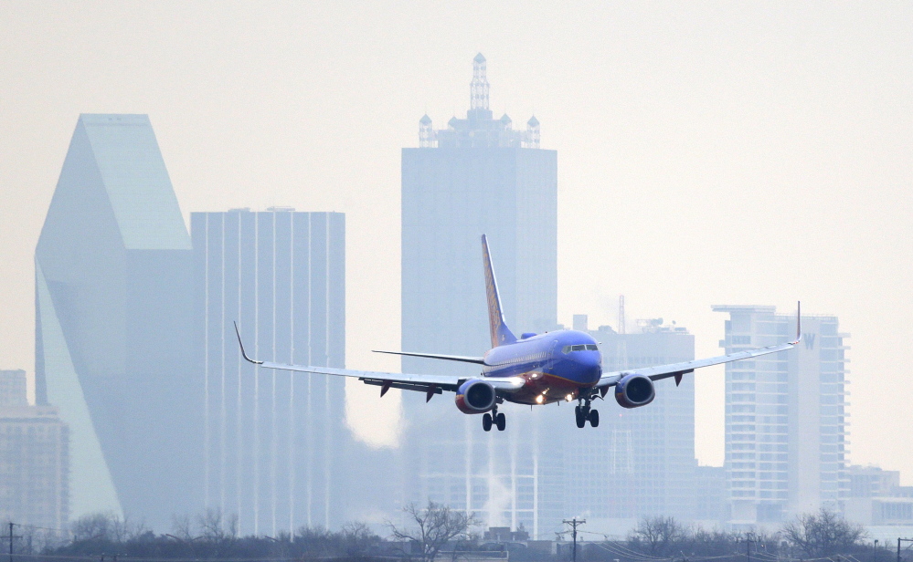 The Associated Press
In this Feb. 3, 2014 file photo, a Southwest Airlines jet plane lines up for a landing at Love Field in Dallas.