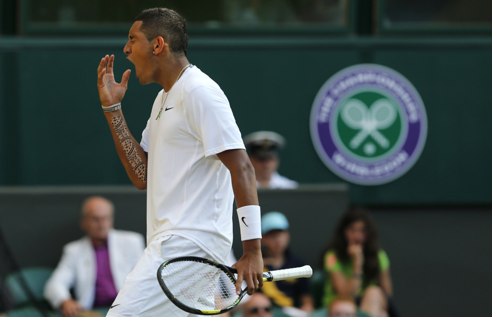 Nick Kyrgios of Australia shouts out as he plays against Rafael Nadal of Spain during their men’s singles match on Centre Court in Wimbledon, London, Tuesday, July 1, 2014.