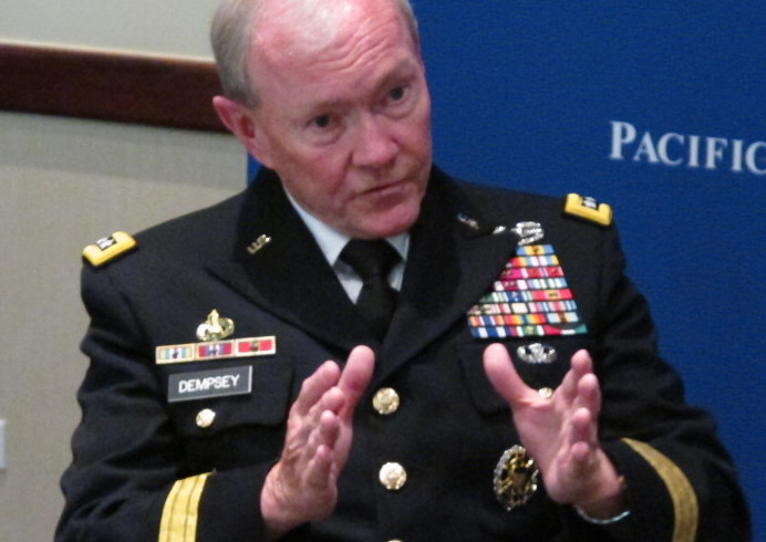 Gen. Martin Dempsey, chairman of the Joint Chiefs of Staff, speaks to reporters after a forum on military issues in Honolulu on Tuesday.