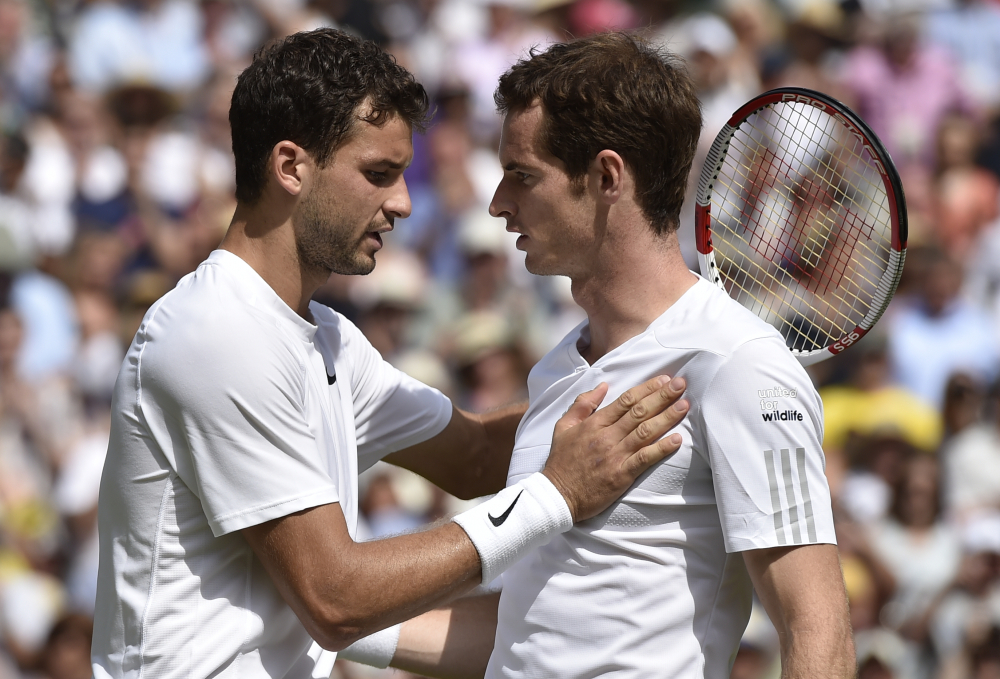 Grigor Dimitrov of Bulgaria, left, is congratulated by defending champion Andy Murray of Britain after winning their men’s singles quarterfinal match.