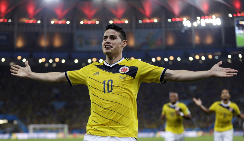 Colombia’s James Rodriguez celebrates after scoring the opening goal during the World Cup round of 16 soccer match between Colombia and Uruguay in Rio de Janeiro, Brazil, on Saturday.
