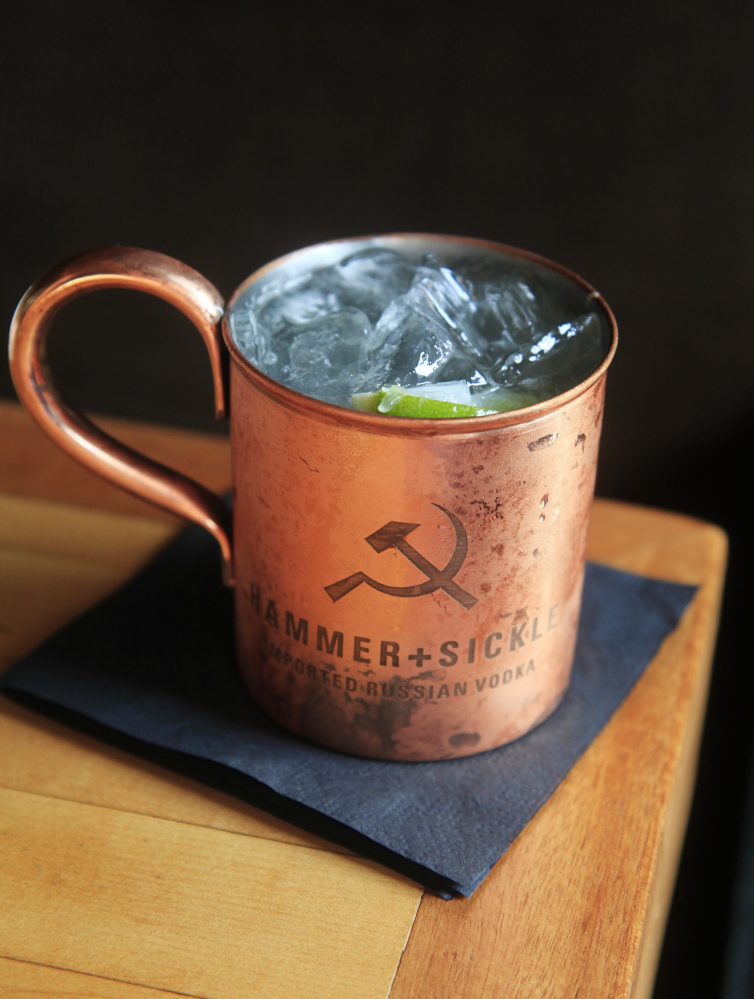 A Moscow Mule, made with ginger beer, fresh-squeezed lime juice and Hammer + Sickle imported Russian vodka and served in a
copper cup. 