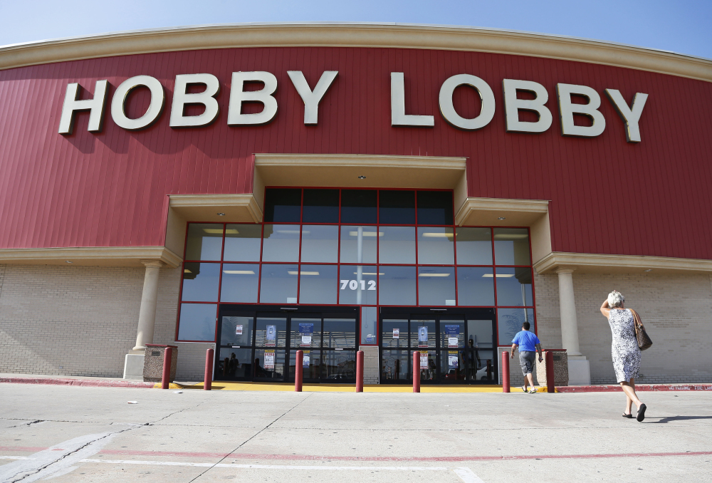 Customers walk into a Hobby Lobby store in Oklahoma City.