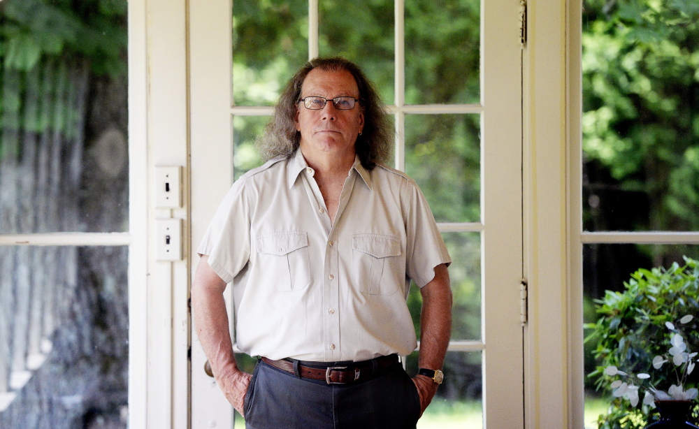 Steve Luttrell, former Portland poet laureate, at his Falmouth home. 