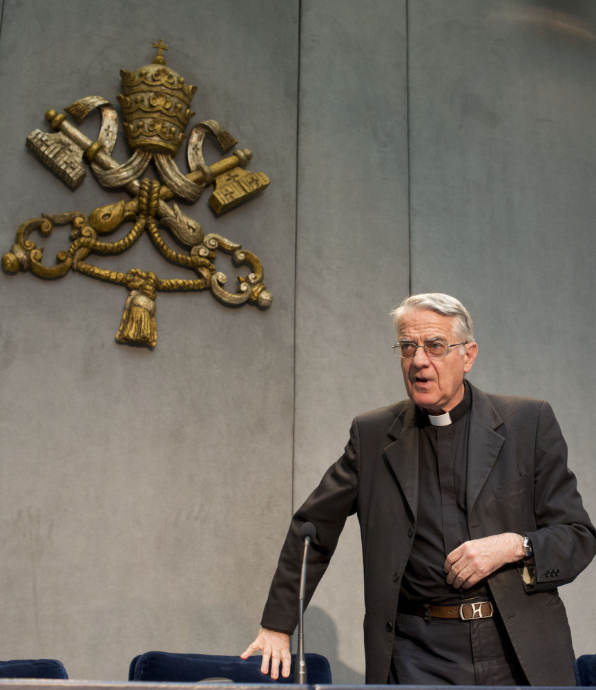 The Rev. Federico Lombardi, Vatican spokesman, arrives for a news conference at the Vatican on Monday. Pope Francis has held his first meeting with Catholics who were sexually abused by clergy. Lombardi said six survivors met privately with the pontiff.
