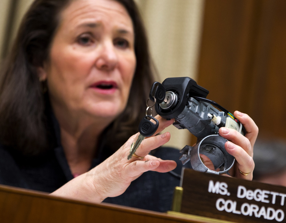 U.S. Rep. Diana DeGette, D-Colo., ranking member of the House Oversight and Investigations subcommittee, holds up a GM ignition switch while she questions General Motors CEO Mary Barra on Capitol Hill in Washington on April 1.