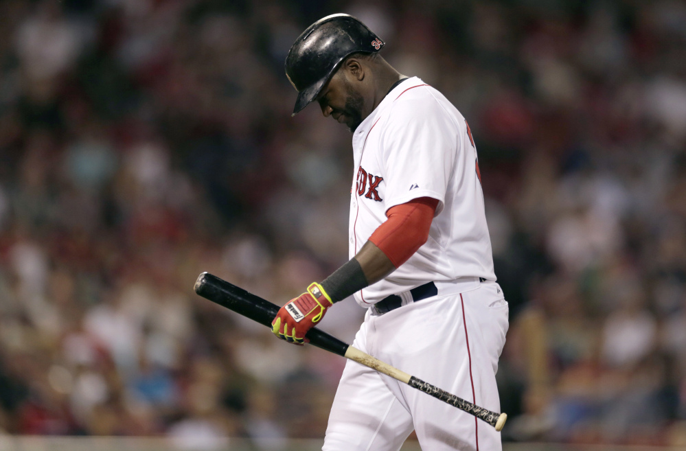 Red Sox designated hitter David Ortiz heads to the dugout after grounding out during the seventh inning Monday.