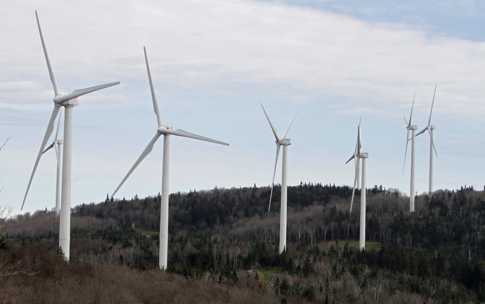 Wind turbines line the hillside at First Wind’s project in Sheffield, Vt. The Associated Press