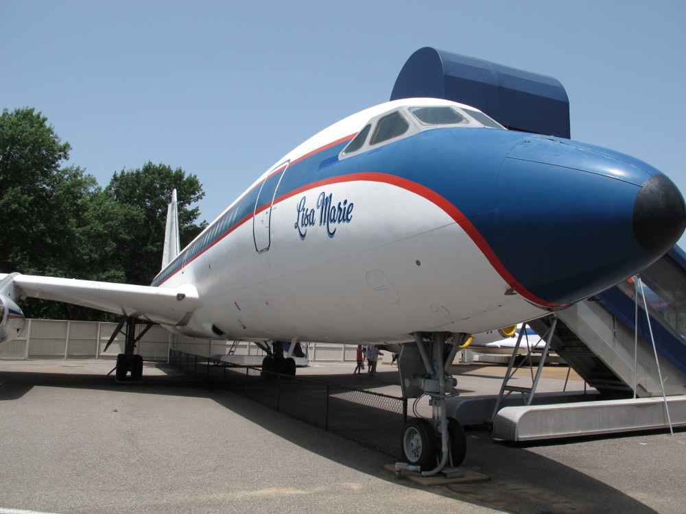 FILE - This Tuesday, July 1, 2014, file photo shows the Lisa Marie, one of two jets once owned by late singer Elvis Presley, which is part of the Graceland tourist attraction in Memphis, Tenn. Priscilla Presley is asking fans of her late ex-husband Elvis Presley to “please calm down” after a report that the jets could be removed from Graceland. (AP Photo/Adrian Sainz, File)