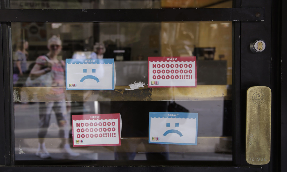 A Crumbs cupcake shop sits empty on Federal Street in Boston on Tuesday. “ A cupcake shop today can’t survive just on cupcakes,” an analyst says. Companies that rely on a single product suffer when customers are fickle.