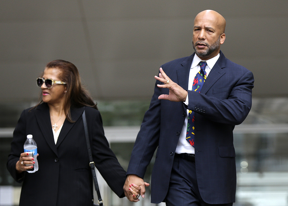 Former New Orleans Mayor Ray Nagin leaves federal court with his wife, Seletha Nagin, after being sentenced in New Orleans on Wednesday.