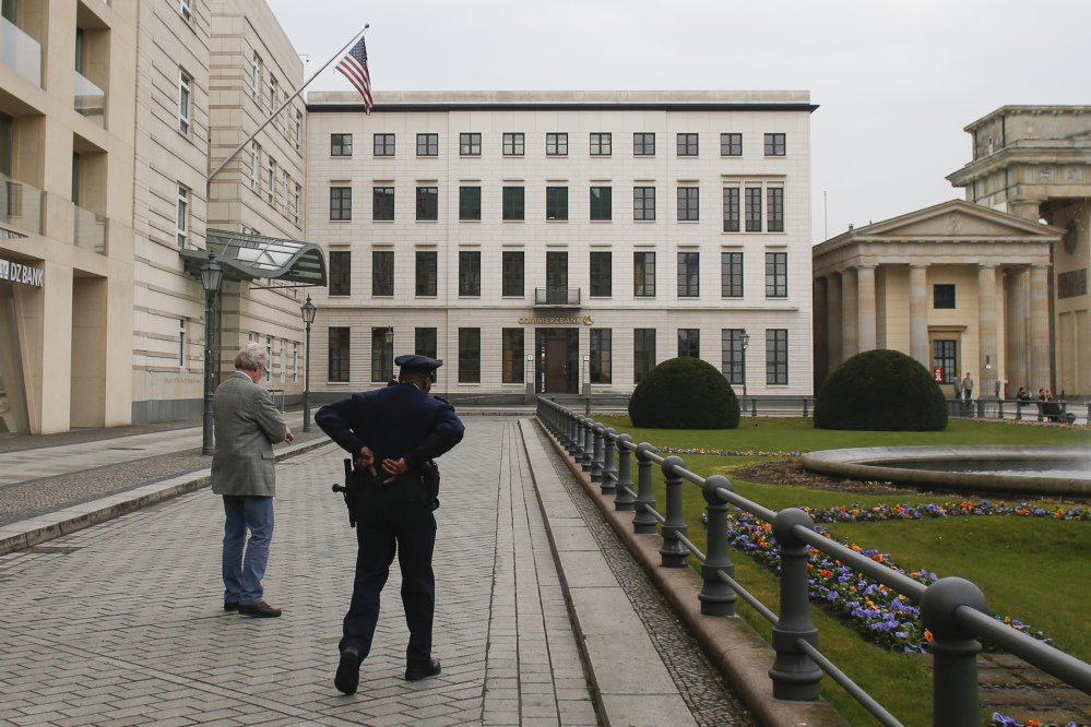 United States security officers patrol in front of the  U.S. embassy in Berlin in this 2013 photo. Germany took the dramatic step Thursday of asking the top U.S. intelligence official in Berlin to leave the country, following two reported cases of suspected U.S. spying and the yearlong spat over eavesdropping by the National Security Agency.