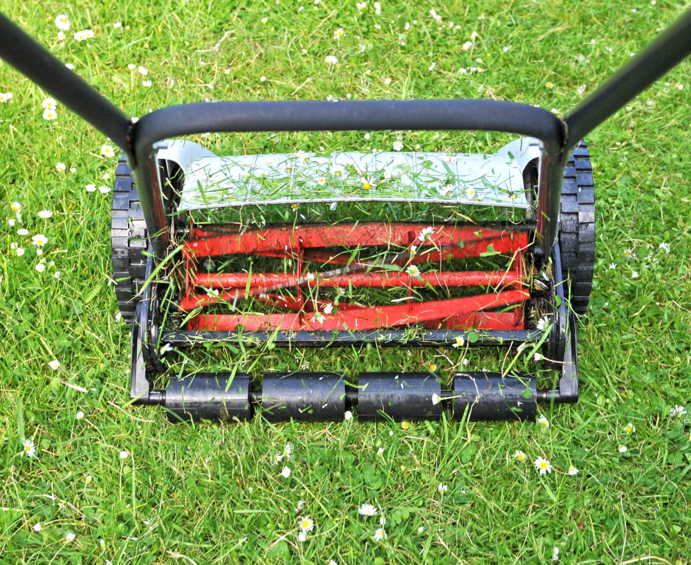 You won’t pollute the soil or air with a manual reel lawnmower. An electric mower is another, though less green, option.