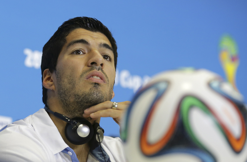 The Associated Press
Uruguay’s Luis Suarez, seen at a press conference on June 23, was banned for nine international matches for biting Italy’s Giorgio Chiellini during their World Cup match. He lost his appeal of the penalty Thursday.