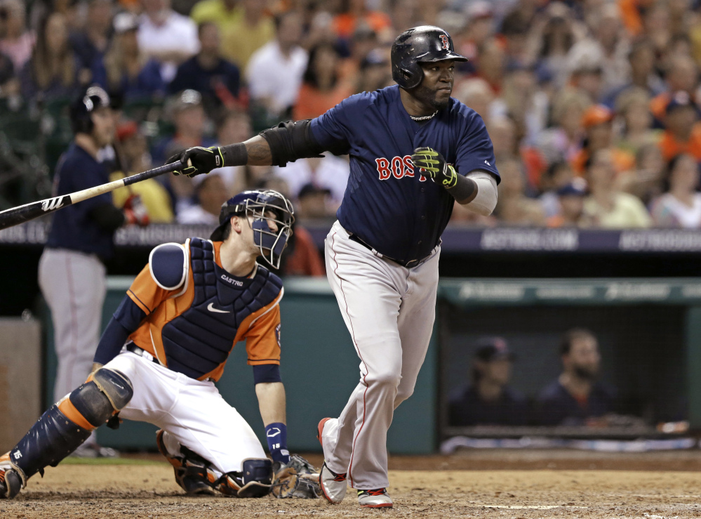Boston’s David Ortiz heads up the first base line on a three-run, bases-loaded double in the sixth inning Friday night in Houston.