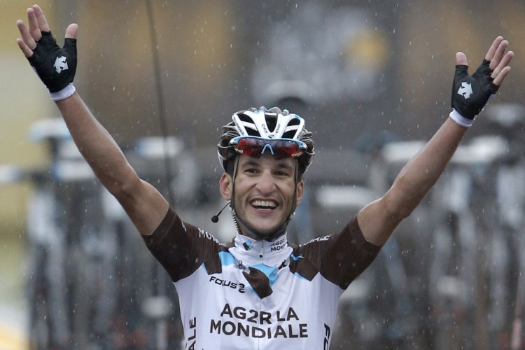 France’s Blel Kadri crosses the finish line to win the eighth stage of the Tour de France on Saturday.