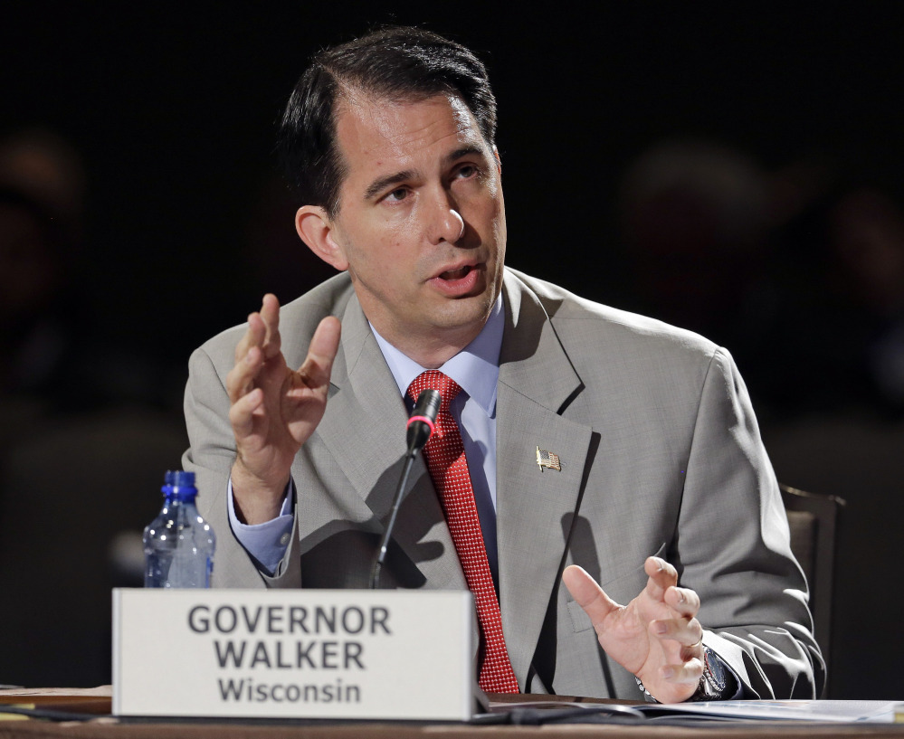 Wisconsin Gov. Scott Walker speaks at the National Governors Association convention on Saturday in Nashville, Tenn. He is trying to strike a balance on same-sex marriage.