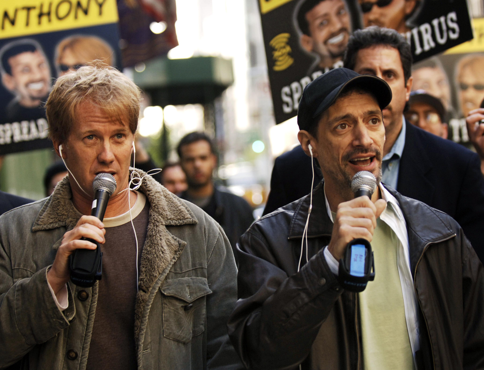Radio shock jock Anthony Cumia, right, is offering no apologies for what satellite radio company SiriusXM called a hate-filled Twitter rant that got him fired. The former co-host of the “Opie and Anthony Show” was let go on July 3 after tweeting his outrage at a woman he said punched him in the face on a New York street.