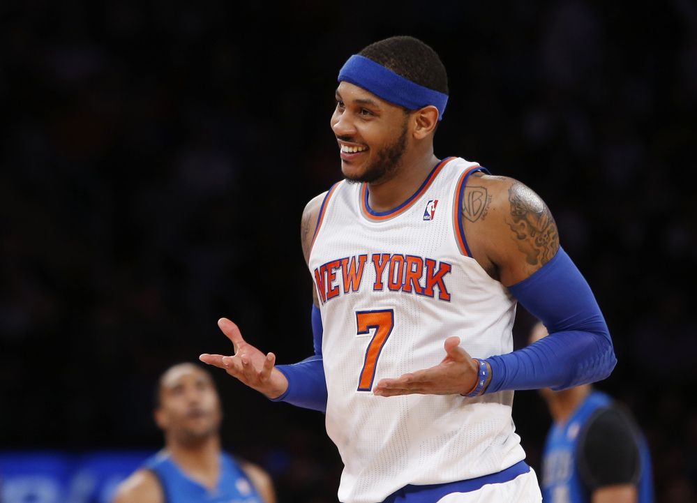 Carmelo Anthony is remaining with the Knicks, saying he wants “to stay and build here with this city and my team.” Anthony made his decision official Sunday with a posting on his website. He writes: “In the end, I am a New York Knick at heart.”