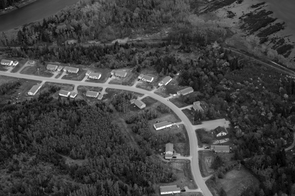 Federally funded homes line a stretch of road on the Pleasant Point reservation in eastern Maine. At the time of the historic Passamaquoddy v. Morton court case, tribe members on the reservation had a per capita income of $700, compared to $2,069 for residents of Washington County, the state’s poorest.