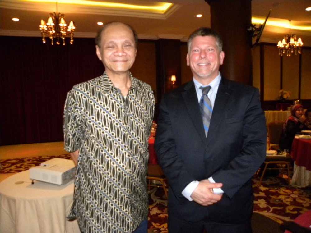 Kennebec Valley Community College President Richard Hopper, right, appears with his former colleague, Pak Bagyo Moeliodihardjo, an Indonesian education official, during a recent trip to Indonesia.