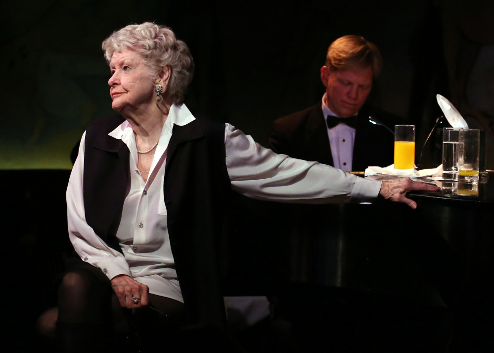 Elaine Stritch performs in her final engagement at the Cafe Carlyle in New York with Rob Bowman at the piano in this 2013 photo.