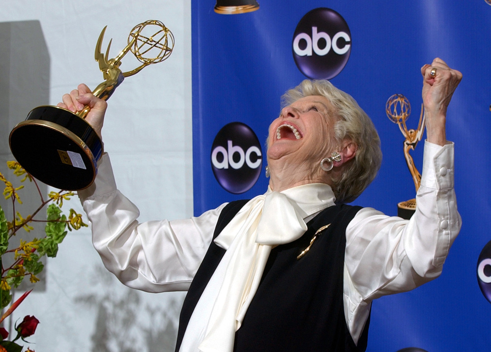 Elaine Stritch celebrates with her trophy for outstanding individual performance in a variety or music program at the 2004 Emmy Awards in Los Angeles.
