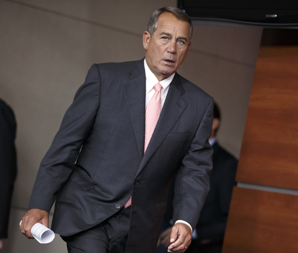 Speaker of the House John Boehner, R-Ohio, arrives for a news conference on Capitol Hill on Thursday. He said, “I don’t have as much optimism as I’d like to have” about Congress solving the U.S. border crisis.