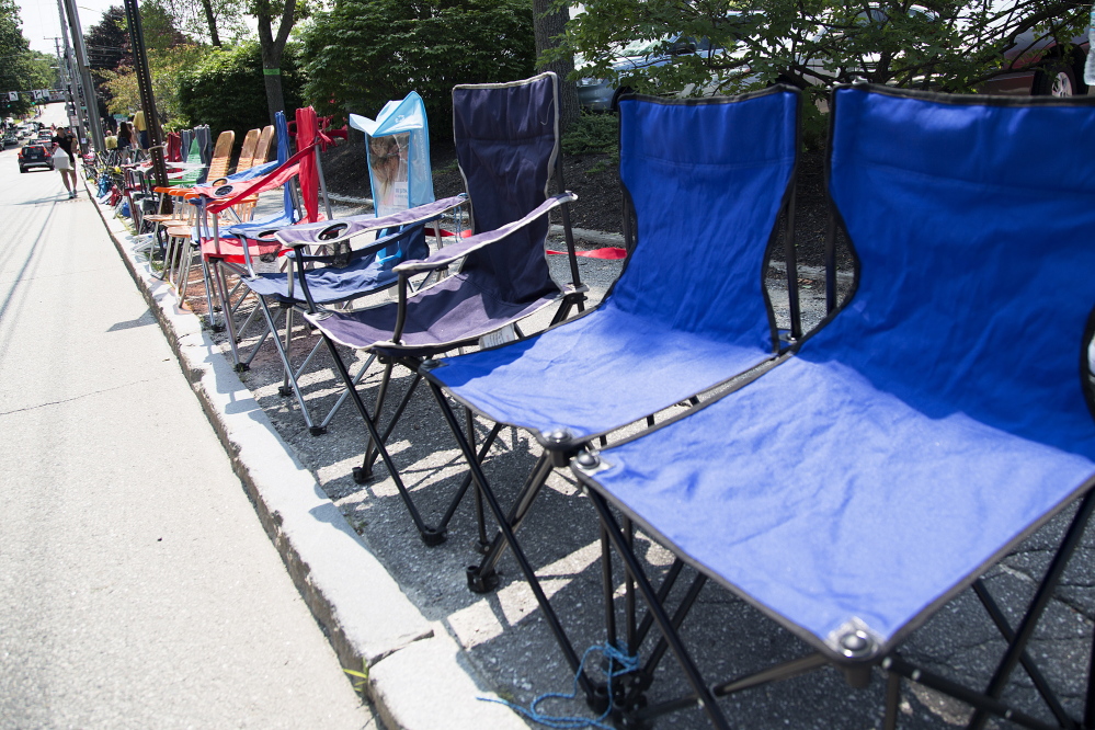 2014: A row of chairs lines Main Street, saving spots for spectators of the Yarmouth Clam Festival parade on Friday.