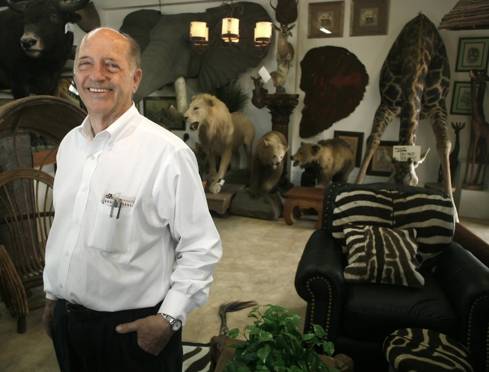 Gene Harris, owner of Art by God, is seen in his store, in April 2009, in Coral Gables, Fla. Harris pleaded guilty recently for brokering an illegal transaction involving black rhino horns, and for knowingly violating sanctions on a species protected by the Endangered Species Act.
