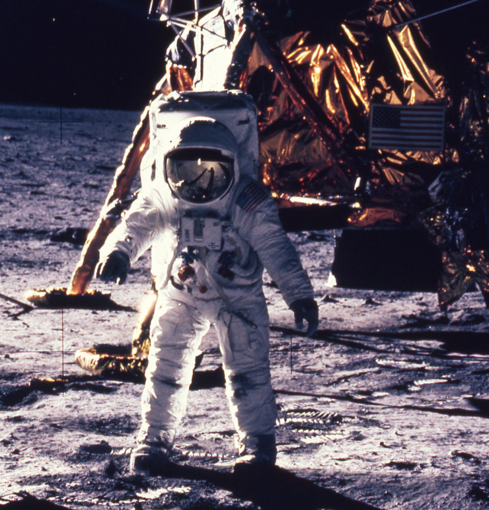 In this July 20, 1969, file photo provided by NASA, astronaut Edwin E. “Buzz” Aldrin Jr. walks on the surface of the moon, shown with seismogaphic equipment that he just set up.