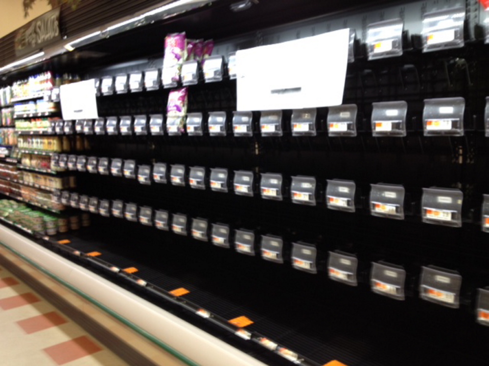 Market Basket shelves normally stocked with prepared salads are empty Saturday at the store in Biddeford amid a corporate leadership squabble.