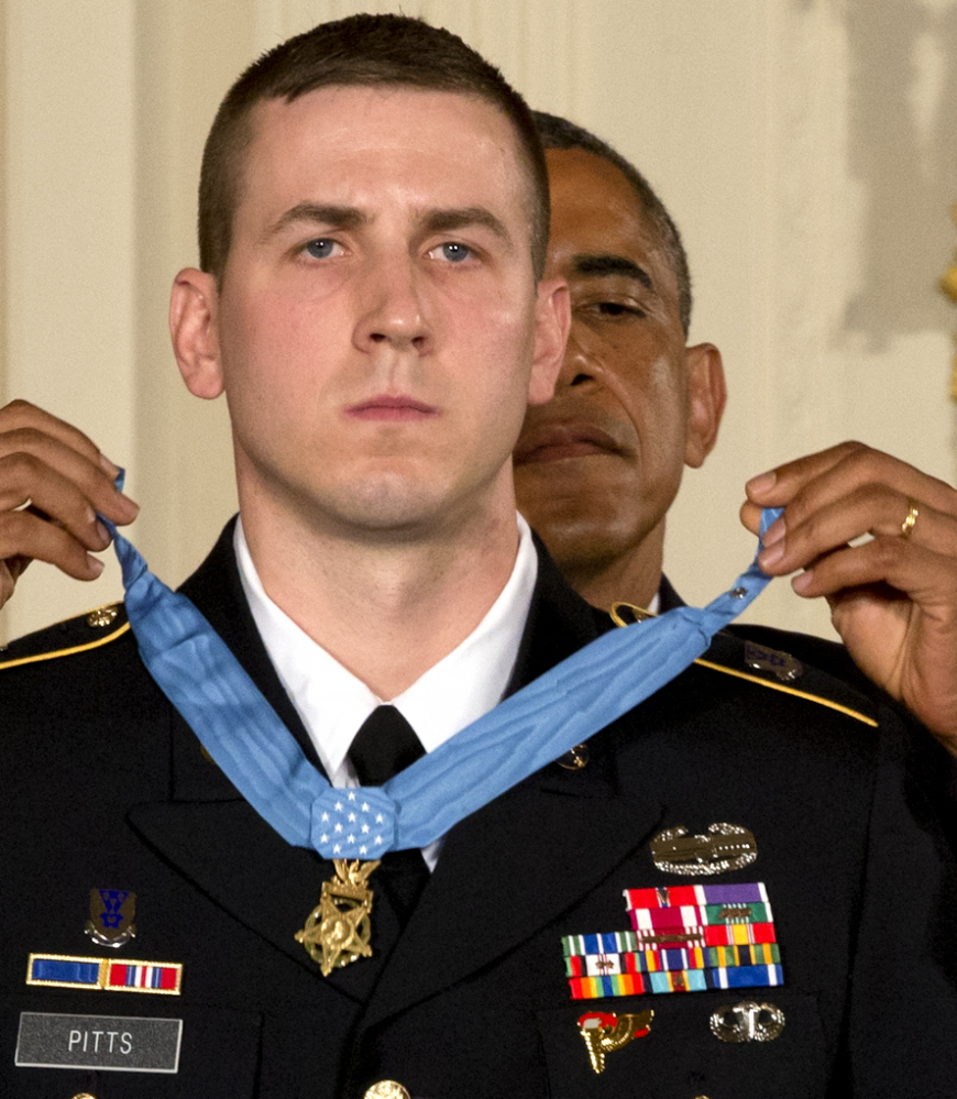 President Obama bestows former Army Staff Sgt. Ryan Pitts with the Medal of Honor in the East Room of the White House on Monday.