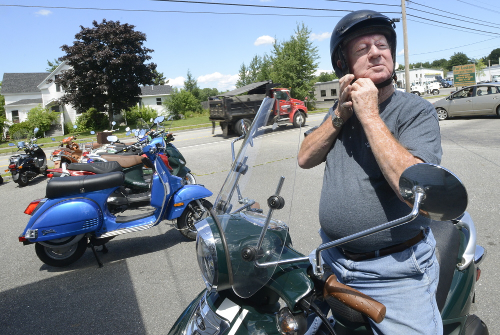 Clayton Farrar, 82, of South Portland says he loves to ride his scooter and visits Cumberland County Scooters shop in Portland several times a week.
John Patriquin/Staff Photographer