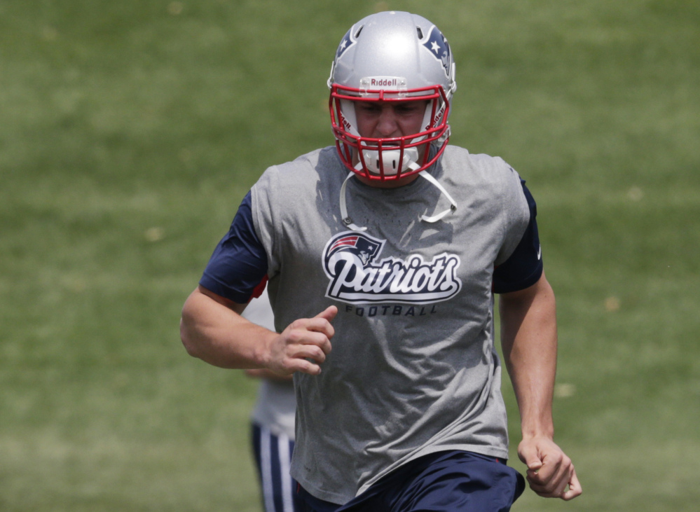 New England Patriots tight end Rob Gronkowski  runs during an NFL football minicamp in Foxborough, Mass., on June 17.