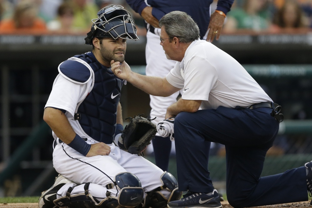 Catcher Alex Avila can keep his chin up thanks to the attention and expertise of Detroit Tigers trainer and Bowdoin College graduate Kevin Rand.