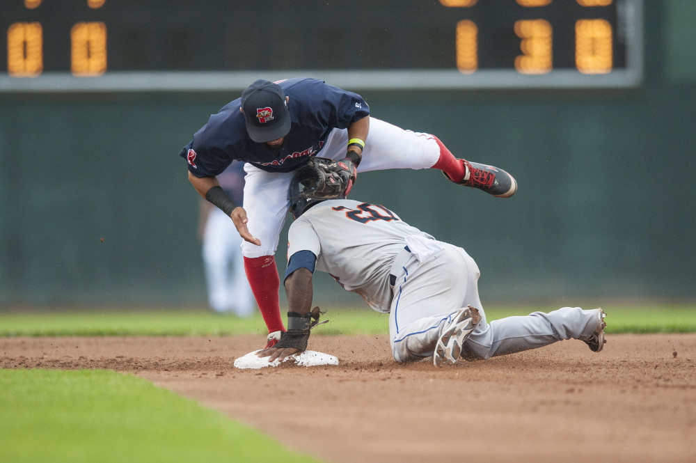 Portland shortstop Ryan Dent attempts to tag Binghamton’s Dilson Herrera on a stolen base in the fifth inning of the Mets’ 4-2 victory at Hadlock Field on Wednesday.